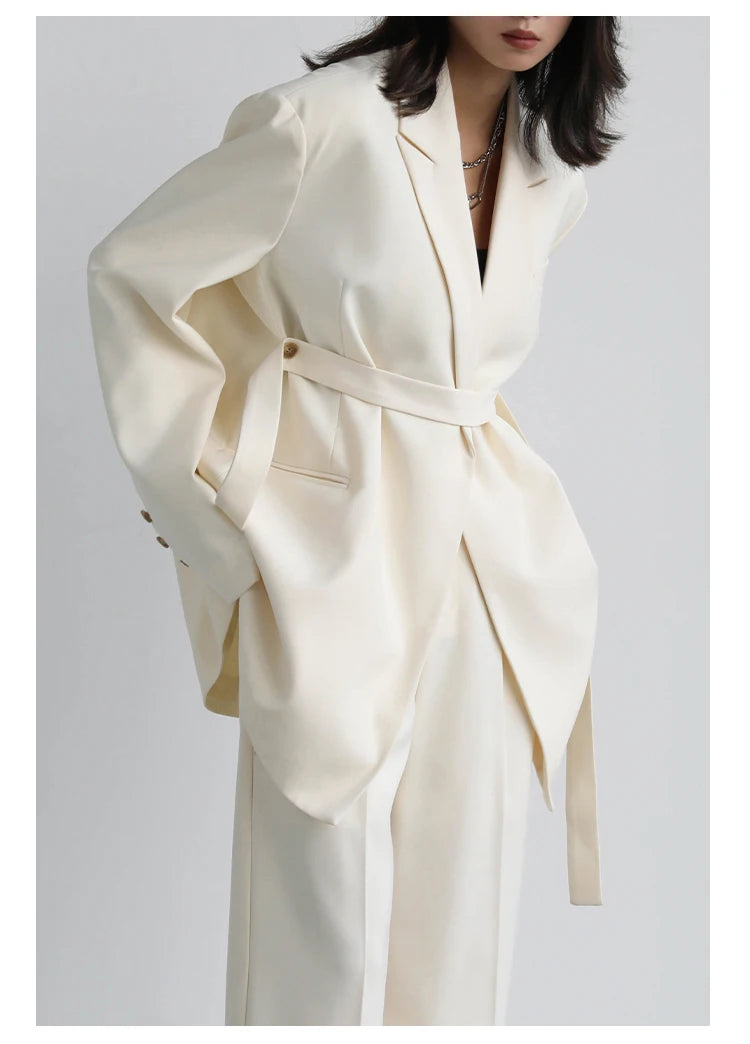 Wide-Shoulder Ribbon Blazer – Statement Outerwear