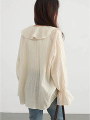 Ruffled V-Neck Lace-Up Blouse – Feminine Elegance with a Modern Edge