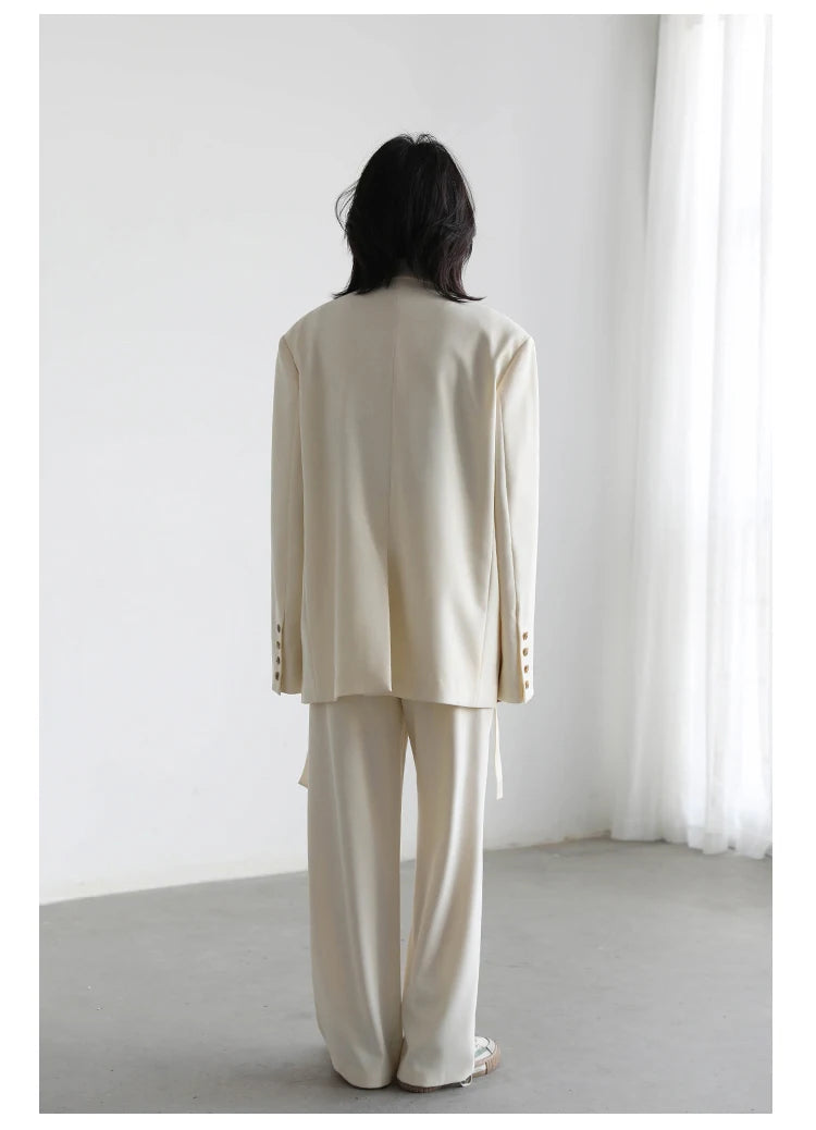 Wide-Shoulder Ribbon Blazer – Statement Outerwear