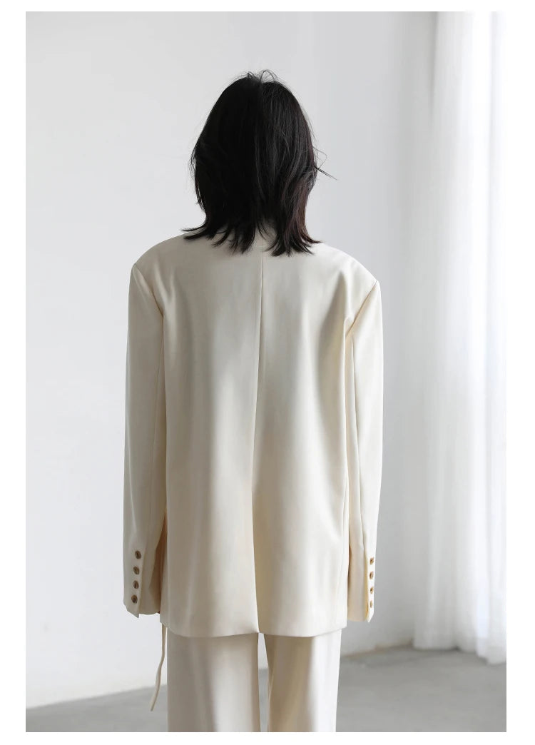 Wide-Shoulder Ribbon Blazer – Statement Outerwear